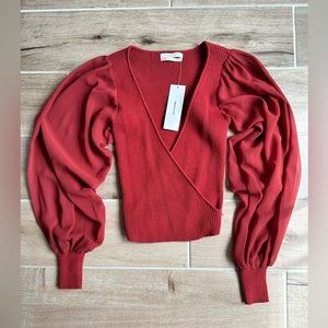 red long sleeve top